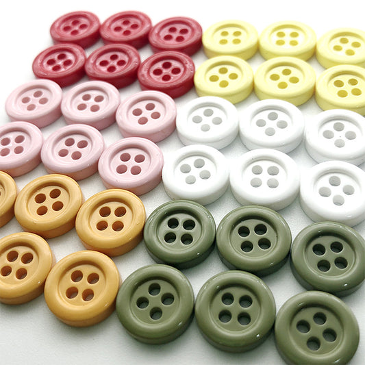 Boutons ronds colorés à quatre trous de 11,5 mm pour les cardigans des enfants 100 pcs